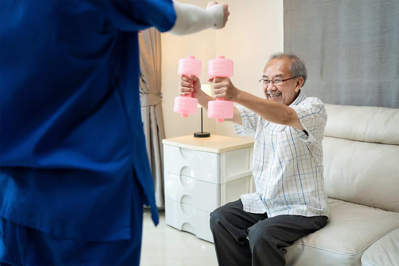 Older man lifting weights, rehab, healthcare